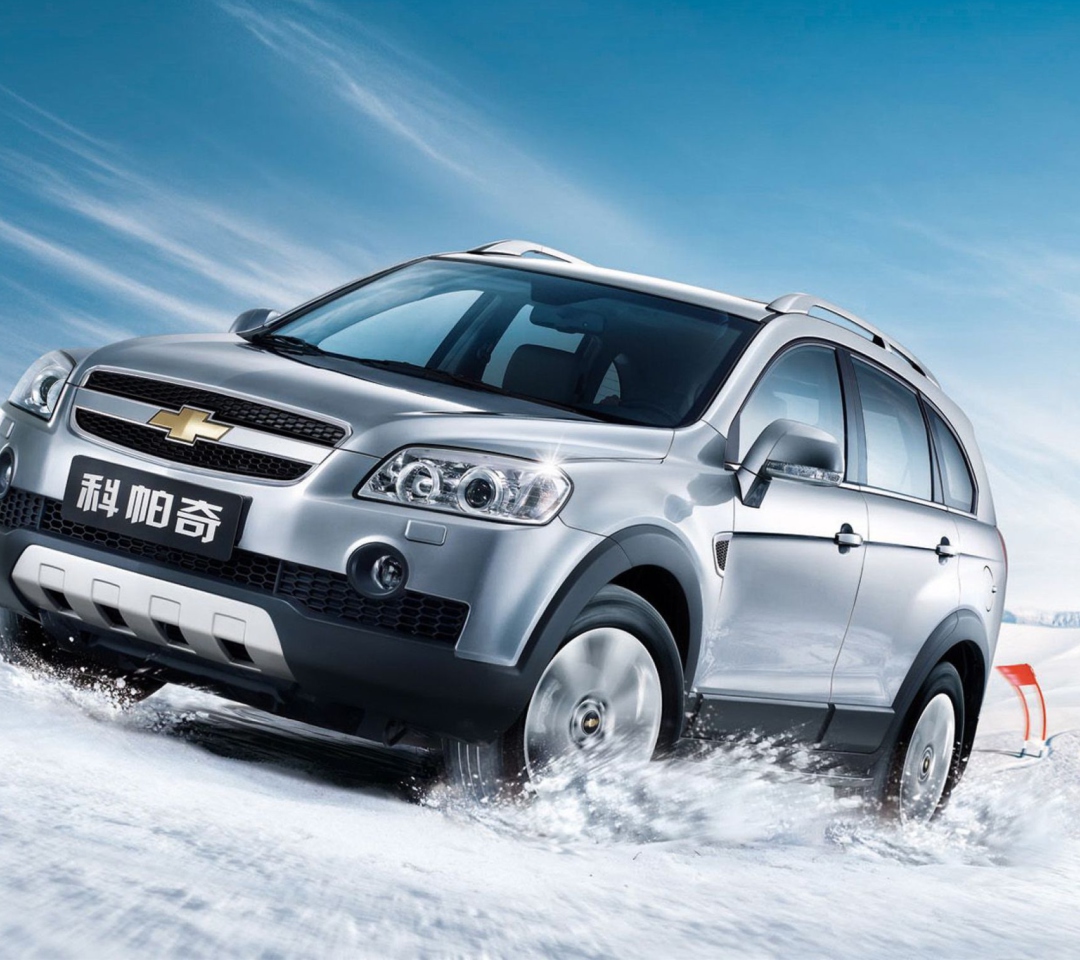 Das Chevrolet Captiva On Snow Wallpaper 1080x960