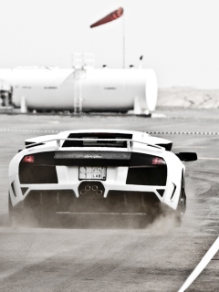 Обои White Lamborghini Murcielago On Track 240x320
