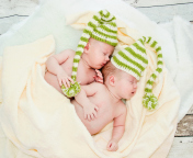 Cute Babies In Green Hats Sleeping wallpaper 176x144