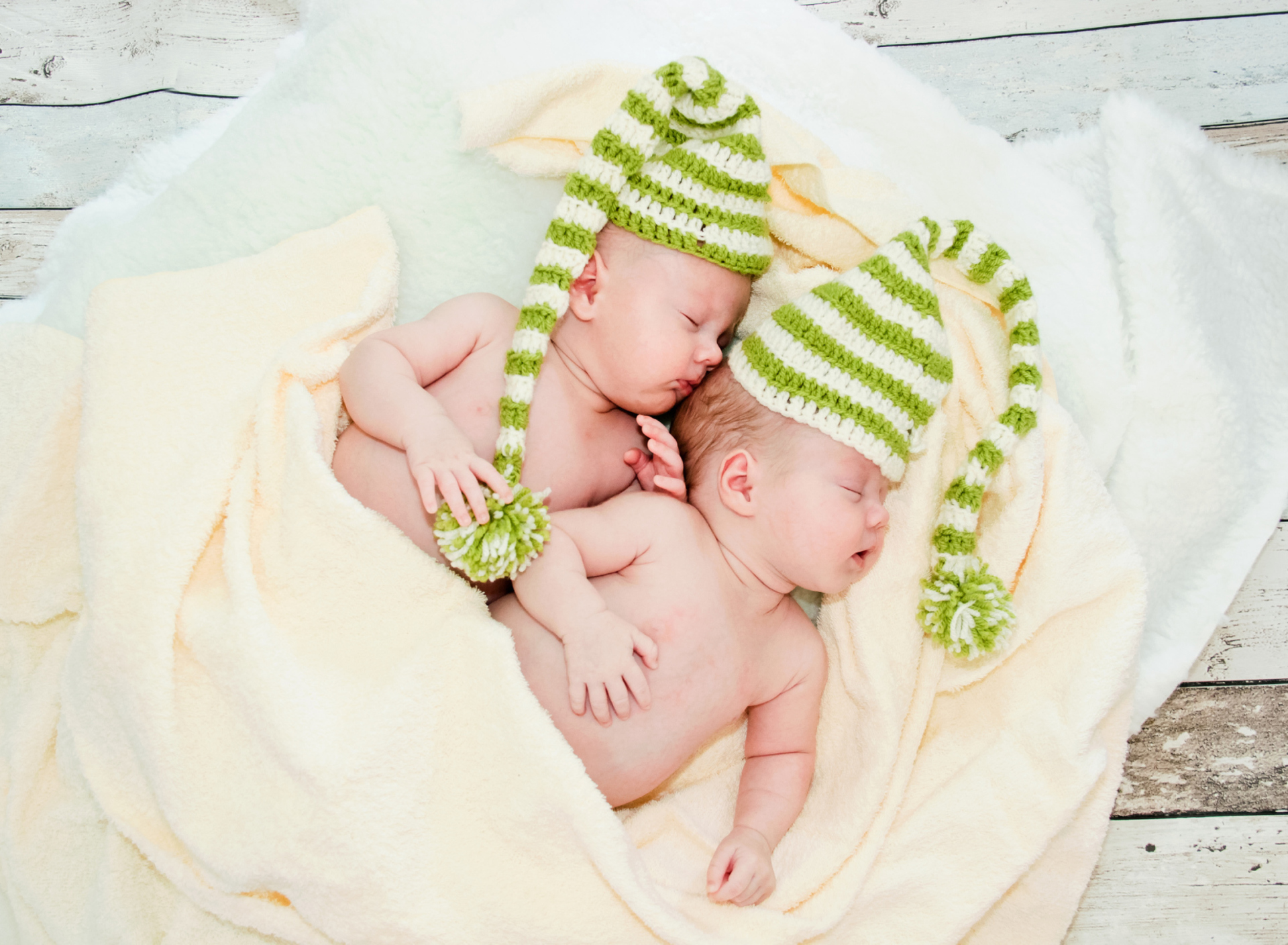 Cute Babies In Green Hats Sleeping wallpaper 1920x1408