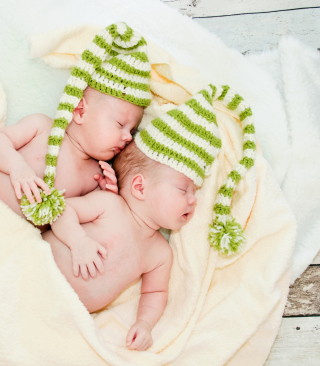 Free Cute Babies In Green Hats Sleeping Picture for 768x1280