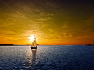 Boat At Sunset wallpaper 320x240