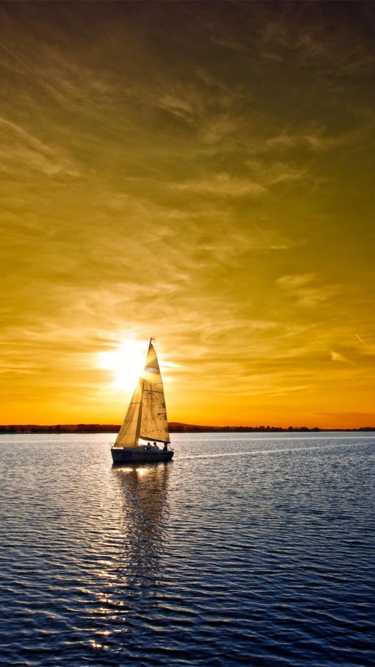 Sfondi Boat At Sunset 750x1334