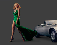 Обои Charlize Theron in Car Advertising 220x176