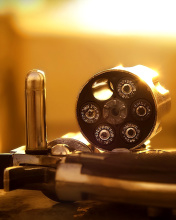 Обои Revolver with Handgun Cartridges 176x220