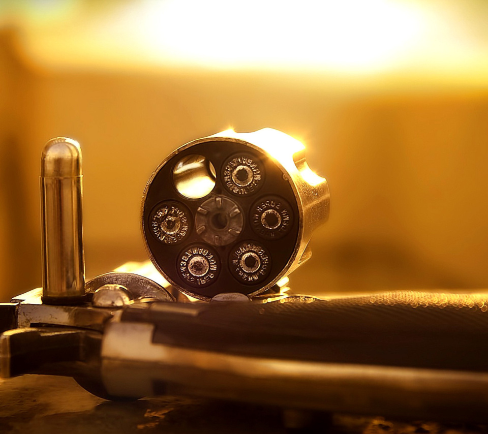 Revolver with Handgun Cartridges wallpaper 960x854