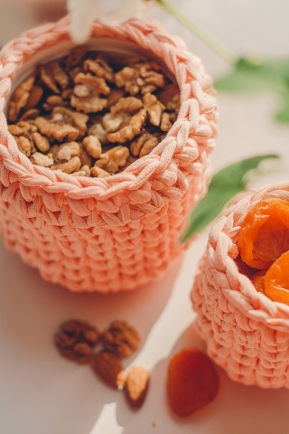 Nuts and dried apricots wallpaper 320x480