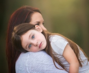 Mom And Daughter With Blue Eyes wallpaper 176x144