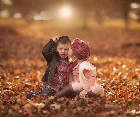 Boy and Girl in Autumn Garden wallpaper 480x400