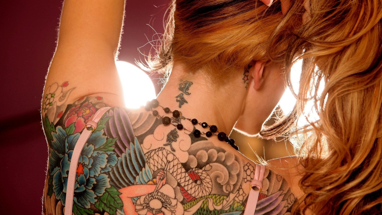 Tattooed Girl's Back wallpaper 1280x720