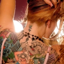 Das Tattooed Girl's Back Wallpaper 128x128