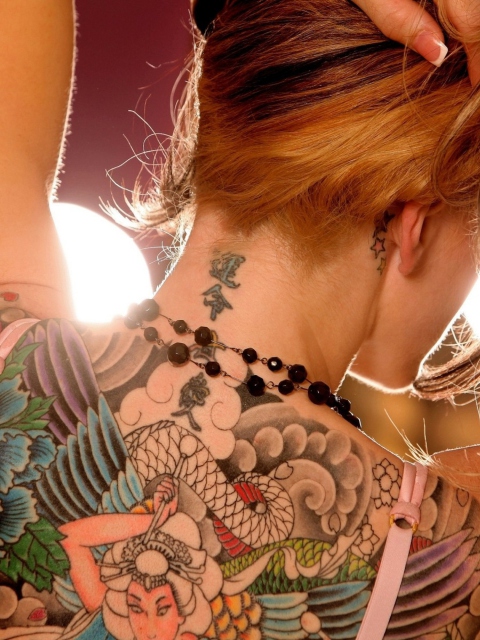 Tattooed Girl's Back wallpaper 480x640
