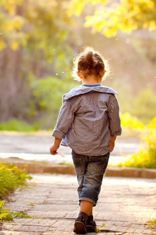 Little Girl Walking In Park wallpaper 320x480