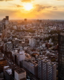 Fondo de pantalla Sunset Over Tokyo 128x160