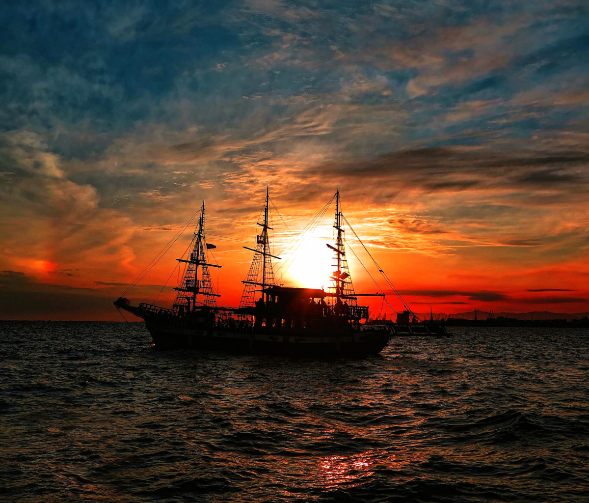 Обои Ship in sunset 1200x1024