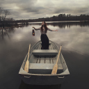 Girl In Boat With Candle wallpaper 128x128