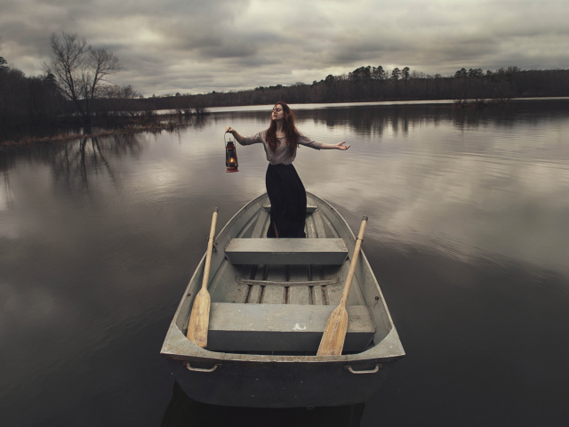 Girl In Boat With Candle wallpaper 640x480