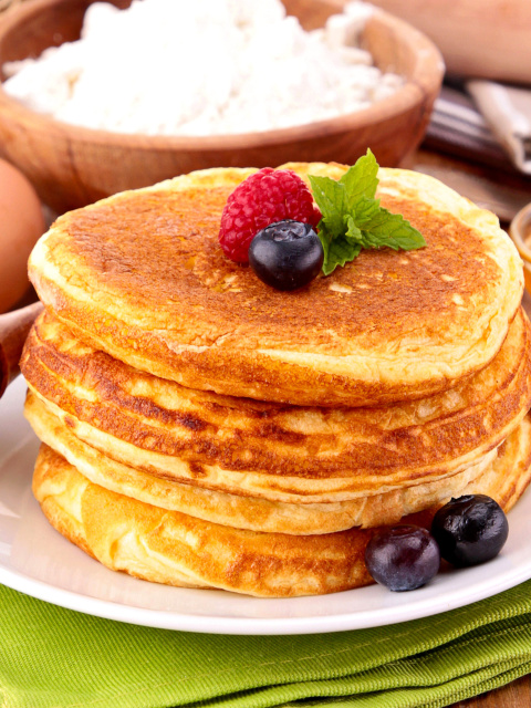 Pancakes with honey wallpaper 480x640