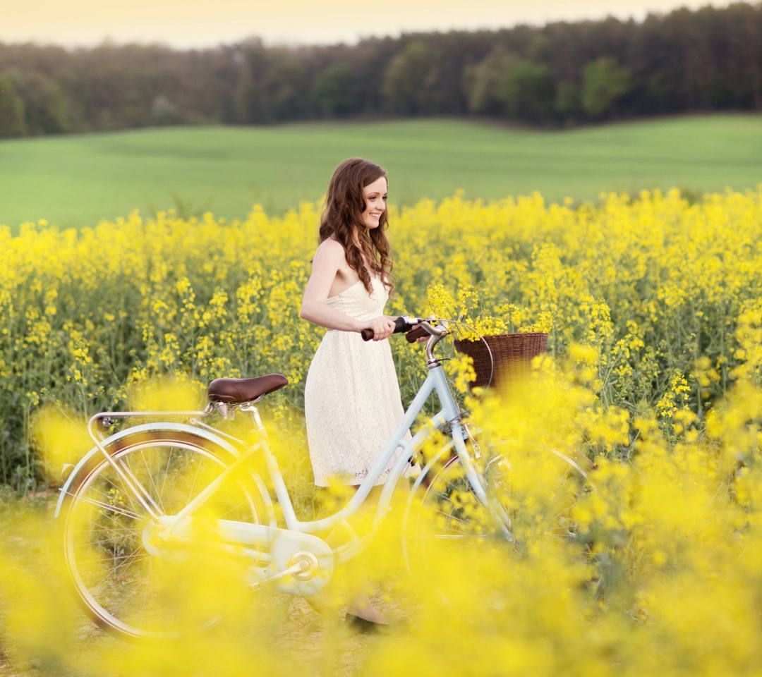 Обои Girl With Bicycle In Yellow Field 1080x960