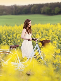 Обои Girl With Bicycle In Yellow Field 240x320