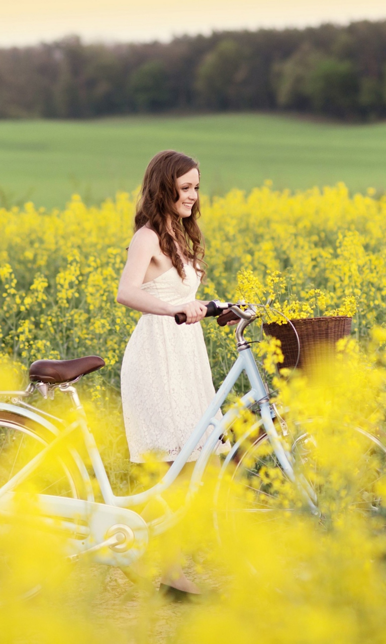 Girl With Bicycle In Yellow Field wallpaper 768x1280