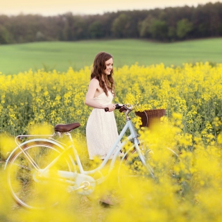 Girl With Bicycle In Yellow Field - Obrázkek zdarma pro 1024x1024
