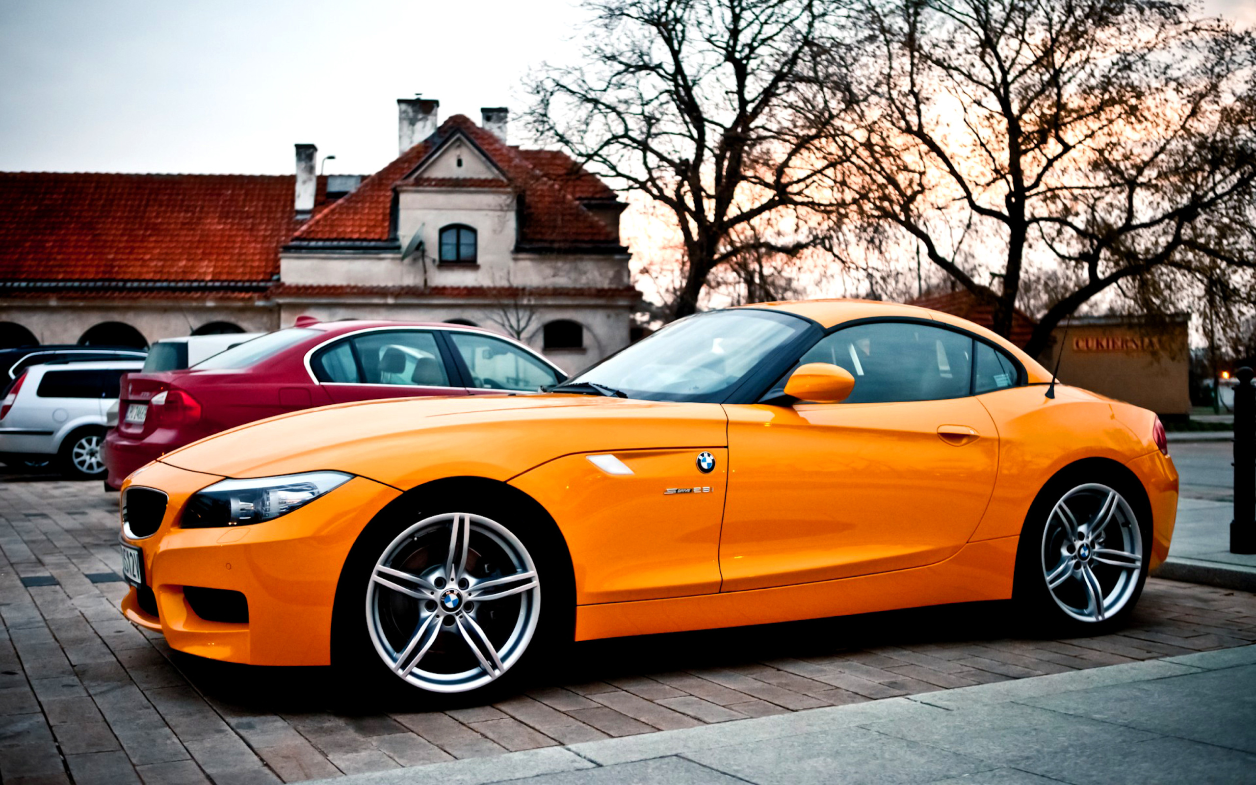 оранжевый автомобиль BMW загрузить