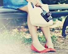 Girl With Camera Sitting On Bench wallpaper 220x176