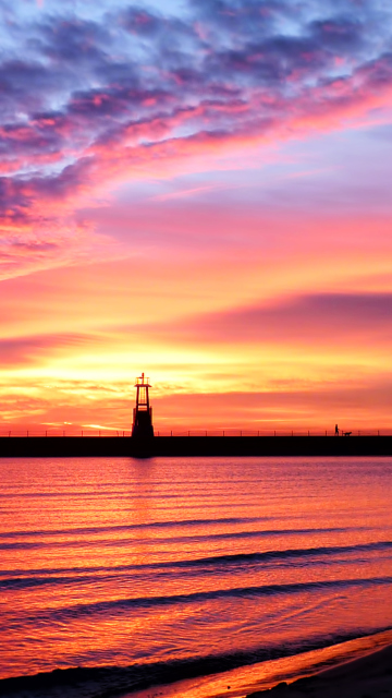 Lighthouse And Red Sunset Beach wallpaper 360x640