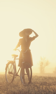 Sfondi Girl And Bicycle On Misty Day 240x400