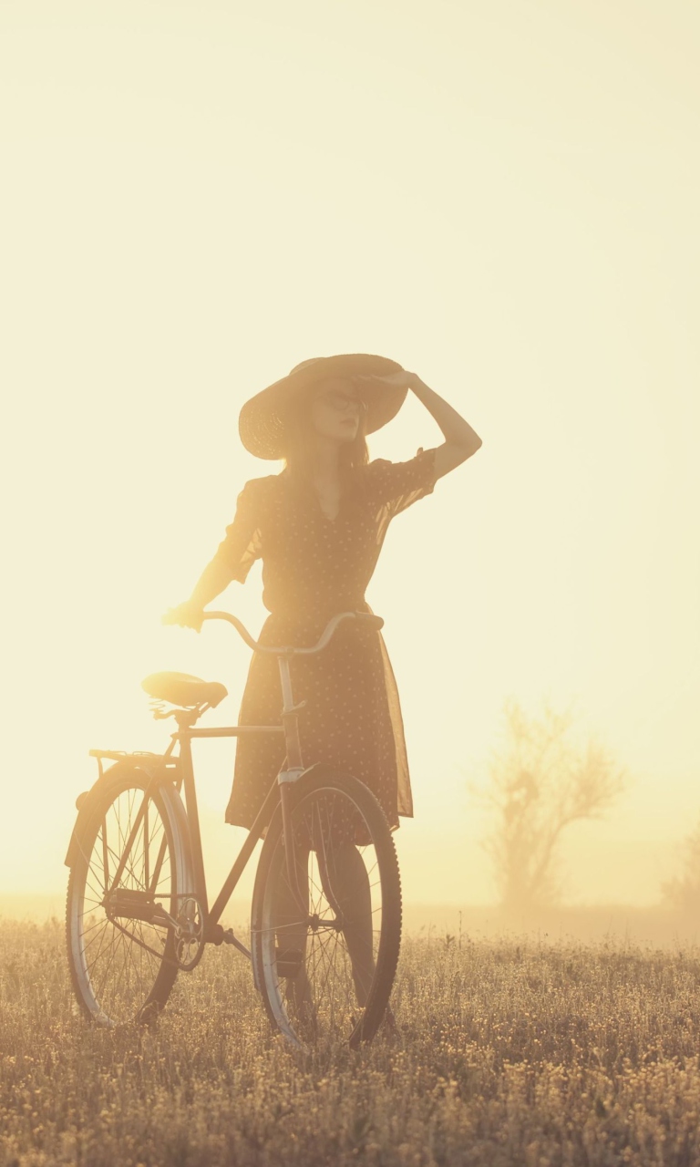 Обои Girl And Bicycle On Misty Day 768x1280