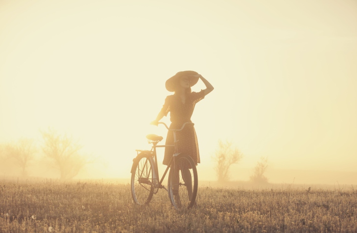 Girl And Bicycle On Misty Day wallpaper