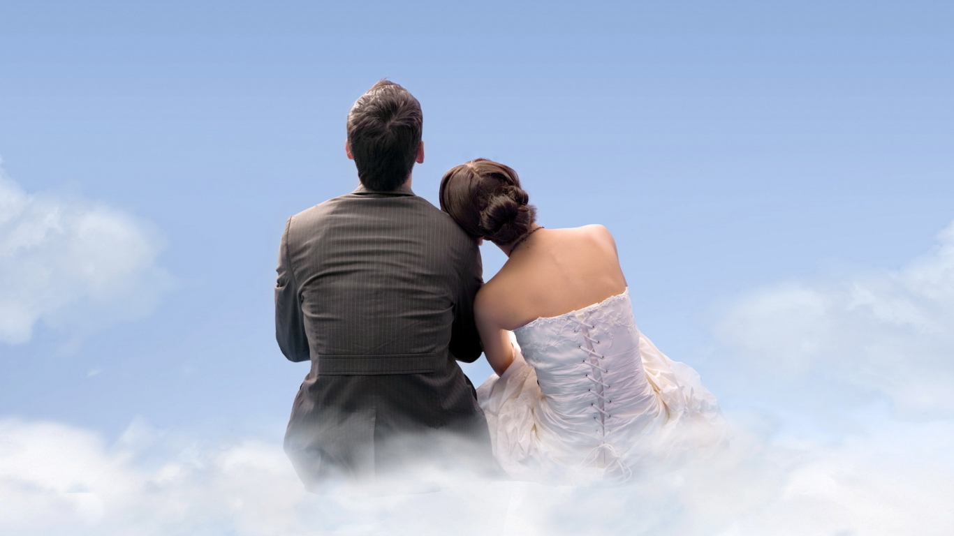 Couple Sitting On Clouds wallpaper 1366x768