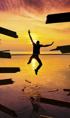 Fondo de pantalla Sunset Jump 240x400