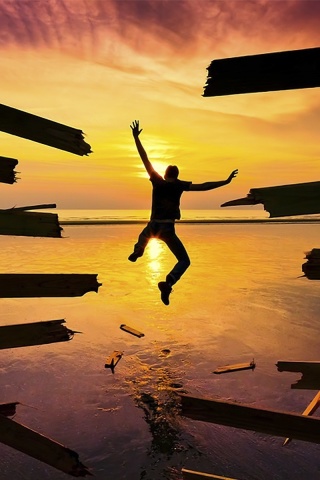 Fondo de pantalla Sunset Jump 320x480