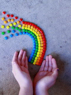 Das Rainbow In Your Hands Wallpaper 240x320