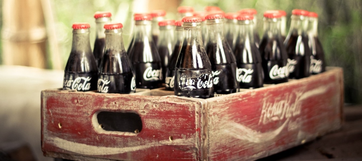 Fondo de pantalla Vintage Coca-Cola Bottles 720x320