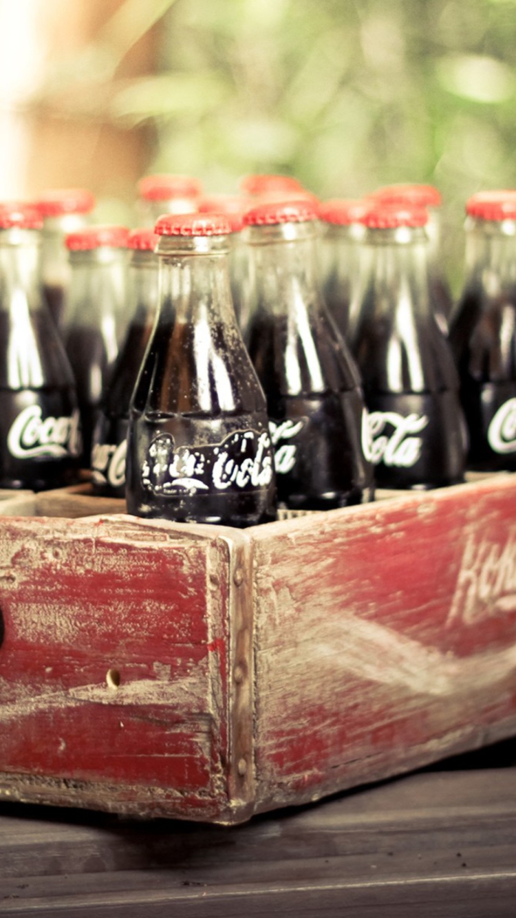 Das Vintage Coca-Cola Bottles Wallpaper 750x1334