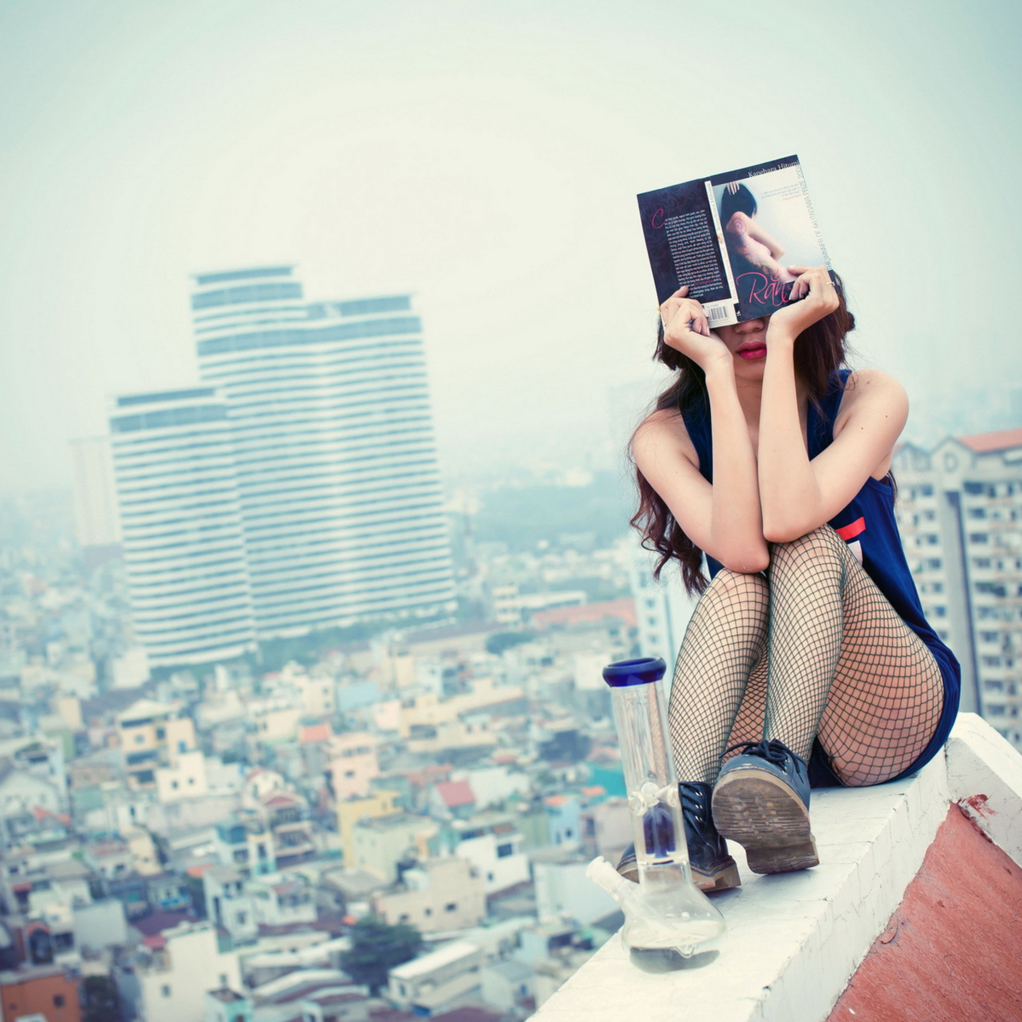 Girl With Book Sitting On Roof wallpaper 2048x2048