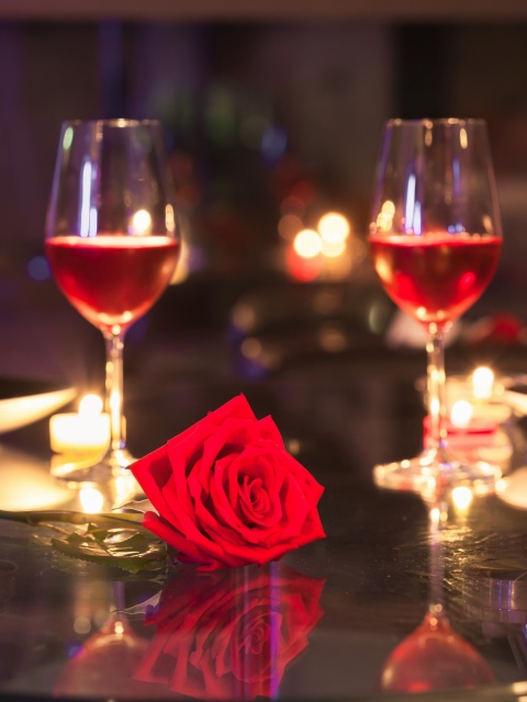 Romantic evening with wine wallpaper 480x640