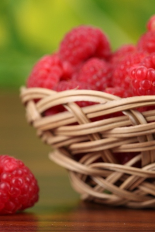Basket Of Raspberries wallpaper 320x480