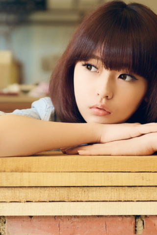 Cute Asian Girl In Thoughts wallpaper 320x480