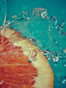 Orange Slice In Water Drops wallpaper 132x176