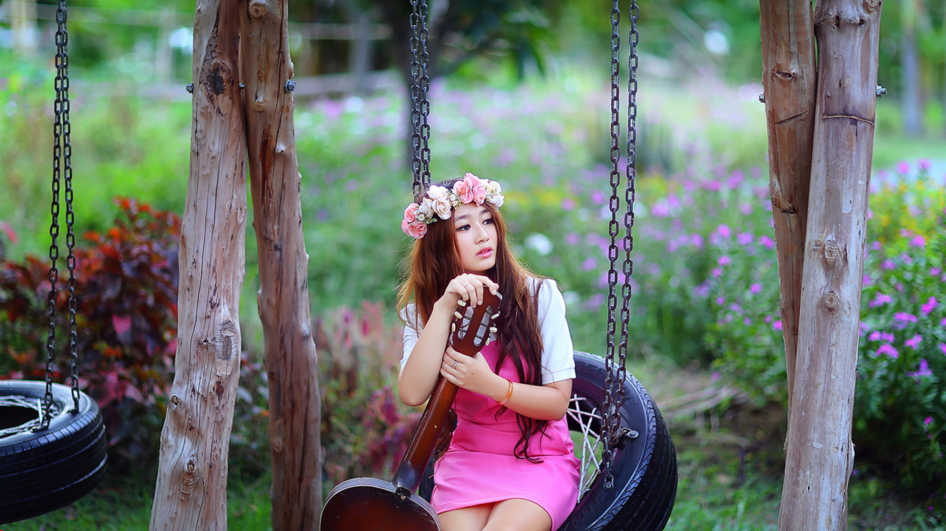 Pretty Asian Girl In Pink Dress And Flower Wreath wallpaper 1366x768