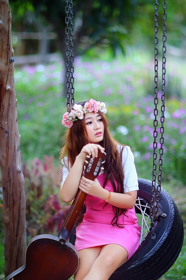 Pretty Asian Girl In Pink Dress And Flower Wreath wallpaper 640x960