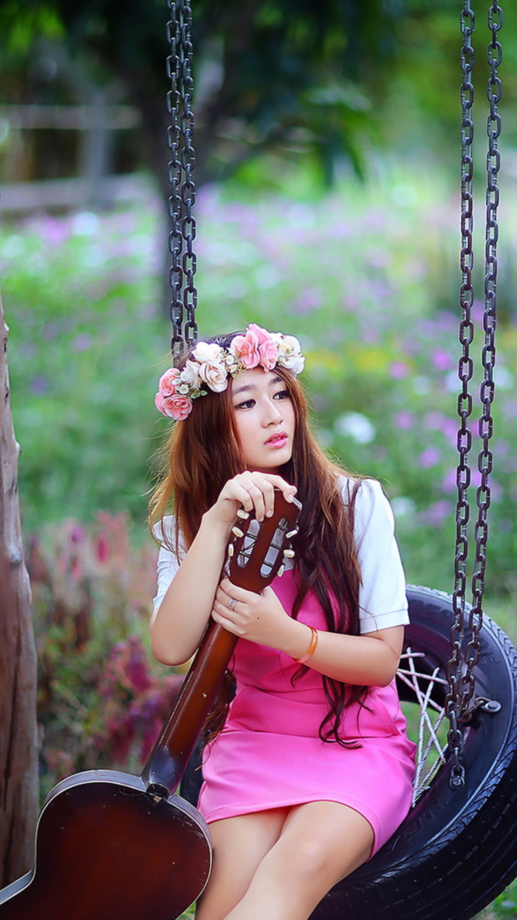 Pretty Asian Girl In Pink Dress And Flower Wreath wallpaper 750x1334
