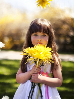 Sweet Child With Yellow Flower Bouquet wallpaper 240x320