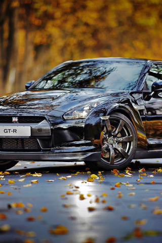 Обои Nissan GT R in Autumn Forest 320x480