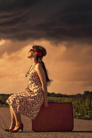 Girl Sitting On Luggage On Road screenshot #1 320x480