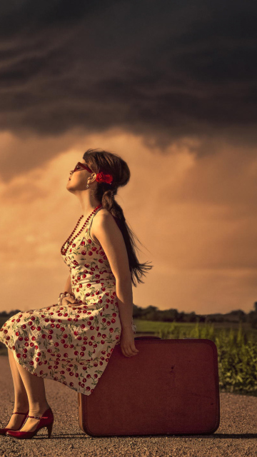 Girl Sitting On Luggage On Road screenshot #1 360x640